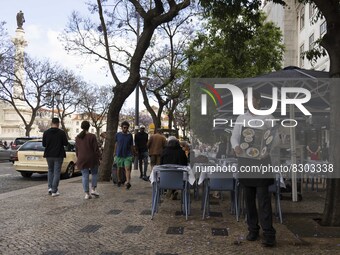 A waiter stands near a restaurant area located in front of Rossio square. Lisbon, May 23, 2022. The European Centre for Disease Prevention a...