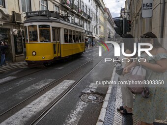 A tram runs along one of the streets in the downtown area, in the Baixa district. Lisbon, May 23, 2022. The European Centre for Disease Prev...