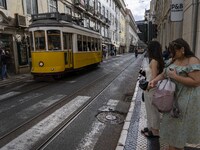 A tram runs along one of the streets in the downtown area, in the Baixa district. Lisbon, May 23, 2022. The European Centre for Disease Prev...