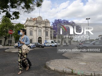 A woman is seen walking near the military museum, in the Santa Apolonia district. Lisbon, May 23, 2022. The European Centre for Disease Prev...