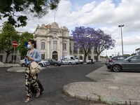 A woman is seen walking near the military museum, in the Santa Apolonia district. Lisbon, May 23, 2022. The European Centre for Disease Prev...