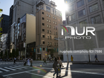 People walk and enjoy on a pedestrian mall at Ginza in Tokyo, Japan on 29 May. (