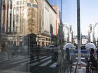 People walk and enjoy on a pedestrian mall at Ginza in Tokyo, Japan on 29 May. (