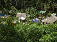 General view of Orang Asli's village. There are 10 houses in there. Malaysia is one of the most fast developing country nevertheless , the m...