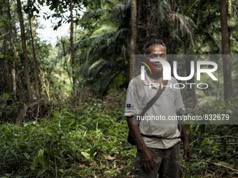 Tok Ulang(65) who is a chief of this village. He is planing to move thier village to higher place from current one to find better place and...