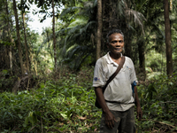 Tok Ulang(65) who is a chief of this village. He is planing to move thier village to higher place from current one to find better place and...