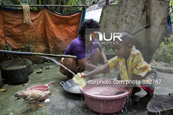 As water supply is limited , this is public place for wash dishes and have a shower. Malaysia is one of the most fast developing country nev...