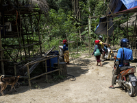 Motovichel is a main transportaion for vilige. They are going to market(somewhere in Gombak) for selling washed Tin. Malaysia is one of the...