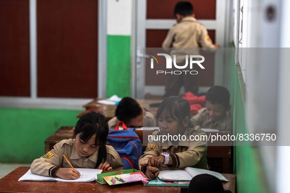 Students in a general class at a school in Tugu Utara Village, Regency Bogor, West Java province, Indonesia on 2 June, 2022. 