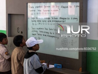 Students in a general class at a school in Tugu Utara Village, Regency Bogor, West Java province, Indonesia on 2 June, 2022. (