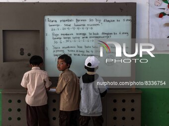 Students in a general class at a school in Tugu Utara Village, Regency Bogor, West Java province, Indonesia on 2 June, 2022. (