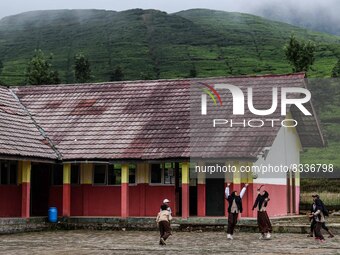 Students play during their half hour break before the end of the class day at a school in Tugu Utara Village, Regency Bogor, West Java provi...