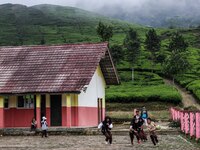 Students play during their half hour break before the end of the class day at a school in Tugu Utara Village, Regency Bogor, West Java provi...