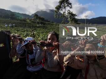 Students are huddling together in a truck to going school in Tugu Utara Village, Regency Bogor, West Java province, Indonesia on 2 June, 202...