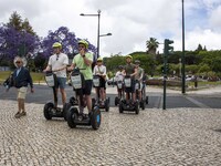 A group of people are seen taking a segway ride around the Marquez de Pombal monument. Lisbon, June 03, 2022. Portugal has already passed th...