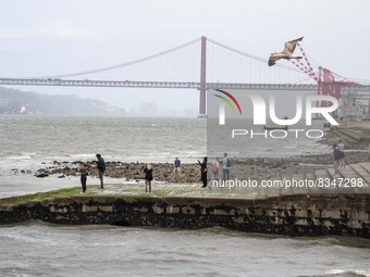 A group of people are seen performing outdoor activities near the Cais das Coluna area. Lisbon, June 03, 2022. Portugal has already passed t...