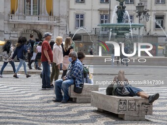 People are seen walking and resting near Rossio Square. Lisbon, June 03, 2022. Portugal has already passed the peak of this COVID-19 pandemi...