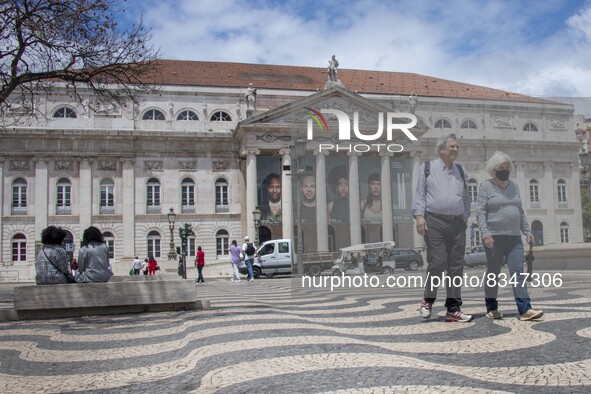 People wearing protective masks are seen walking near Rossio Square. Lisboa, June 03, 2022. Portugal has already passed the peak of this COV...