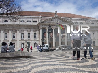 People wearing protective masks are seen walking near Rossio Square. Lisboa, June 03, 2022. Portugal has already passed the peak of this COV...