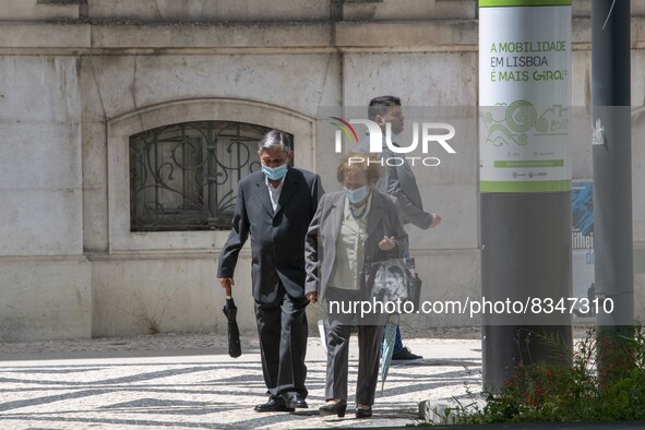 People wearing protective masks are seen walking in the vicinity of the Saldanha district. Lisbon, June 03, 2022. Portugal has already passe...