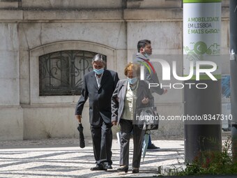 People wearing protective masks are seen walking in the vicinity of the Saldanha district. Lisbon, June 03, 2022. Portugal has already passe...