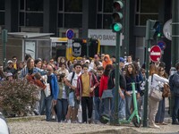 A group of people is seen walking along a nearby avenue that crosses the vicinity of Eduardo VII Gardens. Lisbon, June 03, 2022. Portugal ha...