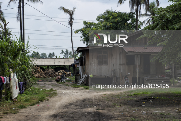 Outside of view of worker's house. The house is located near the charcoal dome / Kampung Keluat, Kelantan / Malaysia. *360 hours of waiting....