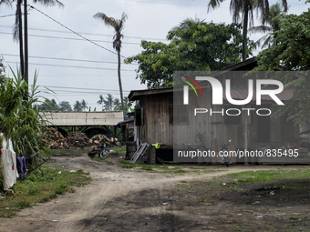 Outside of view of worker's house. The house is located near the charcoal dome / Kampung Keluat, Kelantan / Malaysia. *360 hours of waiting....