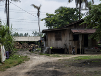 Outside of view of worker's house. The house is located near the charcoal dome / Kampung Keluat, Kelantan / Malaysia. *360 hours of waiting....