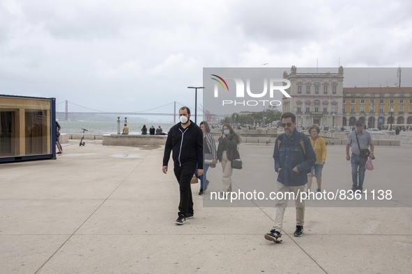 A group of people are seen walking near the Terreiro do Paso area. Lisbon, June 03, 2022. According to data from the General Health Authorit...