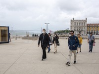 A group of people are seen walking near the Terreiro do Paso area. Lisbon, June 03, 2022. According to data from the General Health Authorit...