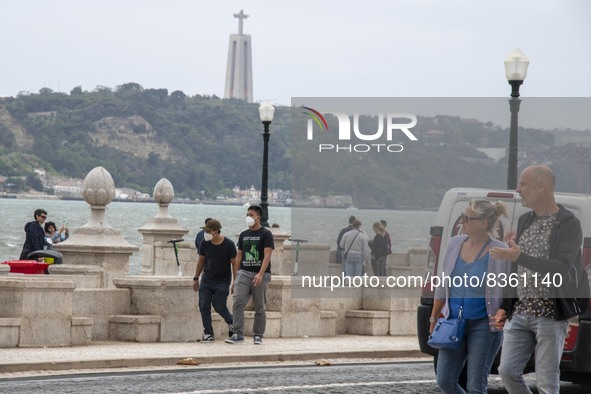 A group of people are seen walking near the Terreiro do Paso area. Lisbon, June 03, 2022. According to data from the General Health Authorit...