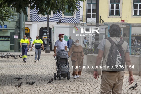 People wearing protective mask are seen walking near Baixa district. Lisbon, June 03, 2022. According to data from the General Health Author...