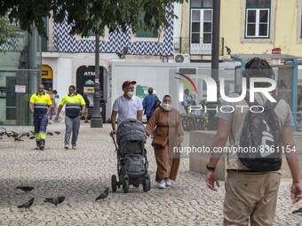 People wearing protective mask are seen walking near Baixa district. Lisbon, June 03, 2022. According to data from the General Health Author...