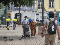 People wearing protective mask are seen walking near Baixa district. Lisbon, June 03, 2022. According to data from the General Health Author...