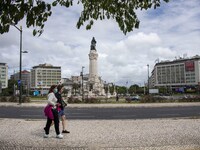 People are seen walking in the vicinity of Marqués de Pombal Monument. Lisbon, June 03, 2022. According to data from the General Health Auth...