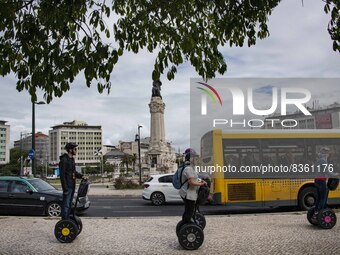 A group of people are seen taking a segway ride around the Marquez de Pombal monument. Lisbon, June 03, 2022. According to data from the Gen...