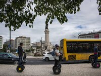 A group of people are seen taking a segway ride around the Marquez de Pombal monument. Lisbon, June 03, 2022. According to data from the Gen...