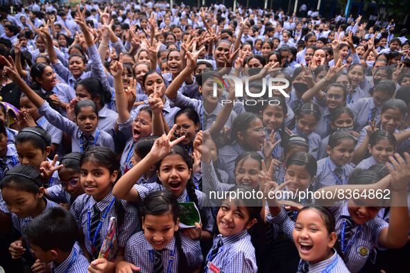 Students celebrate their success after HSLC class 10 examination results were declared, at Christjyoti school in Nagaon district of Assam ,I...