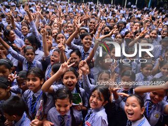 Students celebrate their success after HSLC class 10 examination results were declared, at Christjyoti school in Nagaon district of Assam ,I...