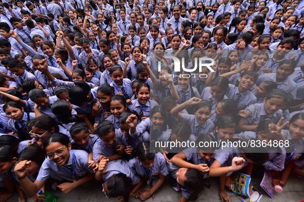 Students celebrate their success after HSLC class 10 examination results were declared, at Christjyoti school in Nagaon district of Assam ,I...