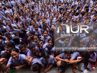 Students celebrate their success after HSLC class 10 examination results were declared, at Christjyoti school in Nagaon district of Assam ,I...