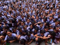 Students celebrate their success after HSLC class 10 examination results were declared, at Christjyoti school in Nagaon district of Assam ,I...