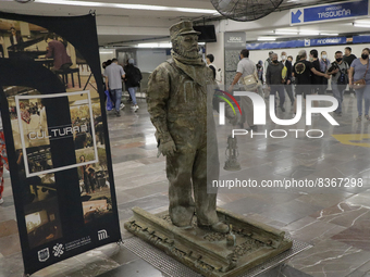 José Miguel Moctezuma, characterised as Don Ferro Ferrocarrilero, during a performance as a living statue inside the Zócalo metro station in...