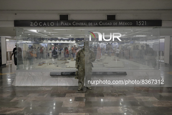 José Miguel Moctezuma, characterised as Don Ferro Ferrocarrilero, during a performance as a living statue inside the Zócalo metro station in...