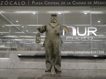 José Miguel Moctezuma, characterised as Don Ferro Ferrocarrilero, during a performance as a living statue inside the Zócalo metro station in...