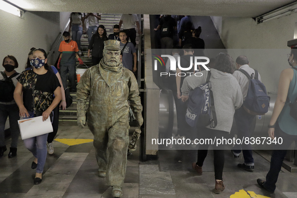 José Miguel Moctezuma, characterised as Don Ferro Ferrocarrilero, during a performance as a living statue inside the Bellas Artes metro stat...