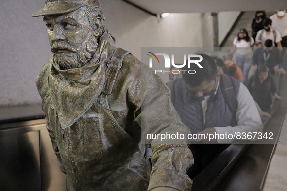 José Miguel Moctezuma, characterised as Don Ferro Ferrocarrilero, during a performance as a living statue on the escalators inside the Bella...