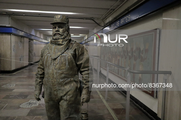 José Miguel Moctezuma, characterised as Don Ferro Ferrocarrilero, during a performance as a living statue inside the Bellas Artes metro stat...