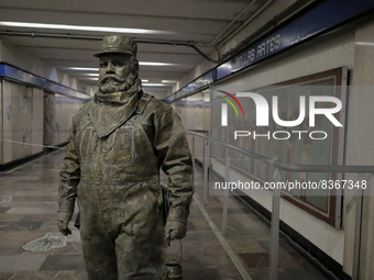 José Miguel Moctezuma, characterised as Don Ferro Ferrocarrilero, during a performance as a living statue inside the Bellas Artes metro stat...